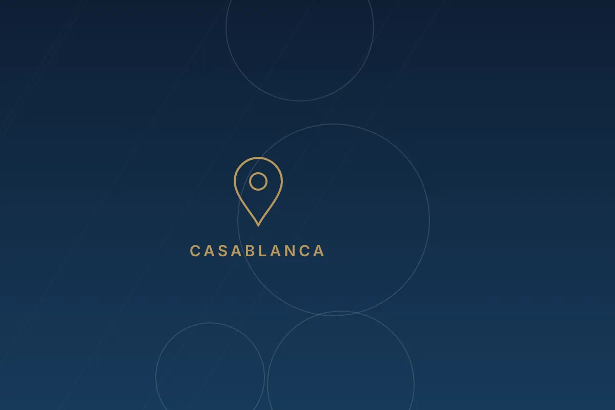 Illustration d'un repère de localisation doré accompagné de la mention Casablanca